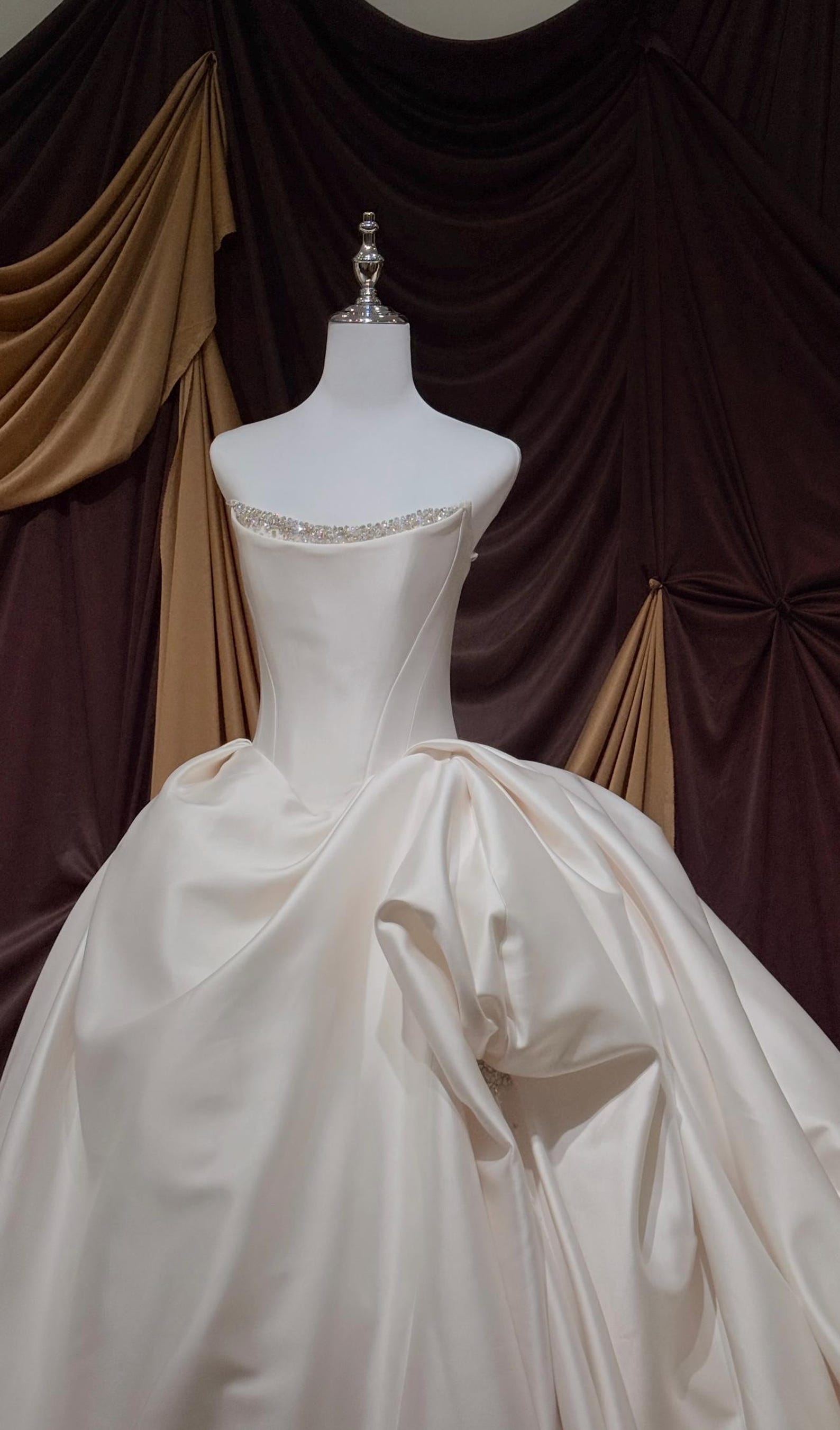 Strapless luxury mikado satin ball gown, crystal neck trim & oversized beaded bow, dreamy princess bridal dress for formal weddings.