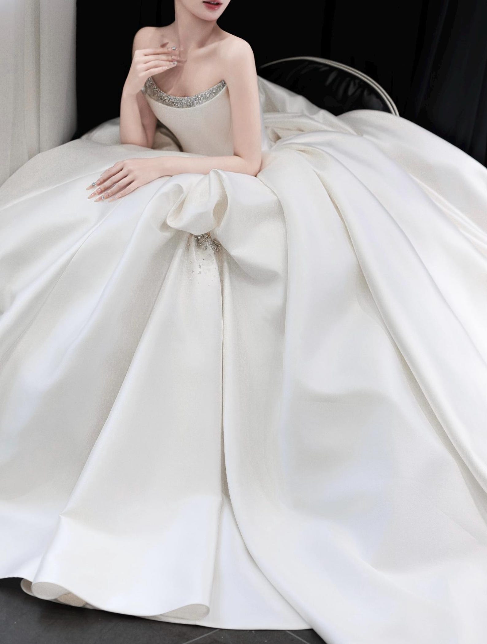 Strapless luxury mikado satin ball gown, crystal neck trim & oversized beaded bow, dreamy princess bridal dress for formal weddings.
