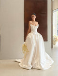 Strapless Ruffled Neck Satin Ball Gown Wedding Dress, Vertical Pleated Corset Bodice, Voluminous Skirt Cathedral Train Custom Bridal Gown